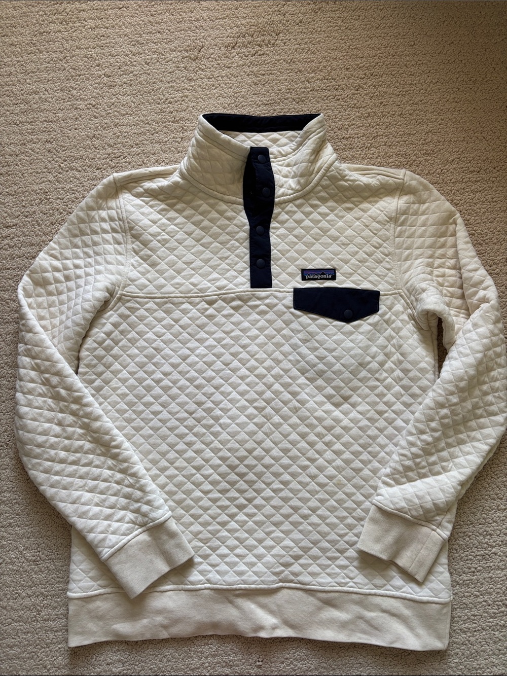 Patagonia Men’s Cream Quilted Pullover with Navy Snap Placket
